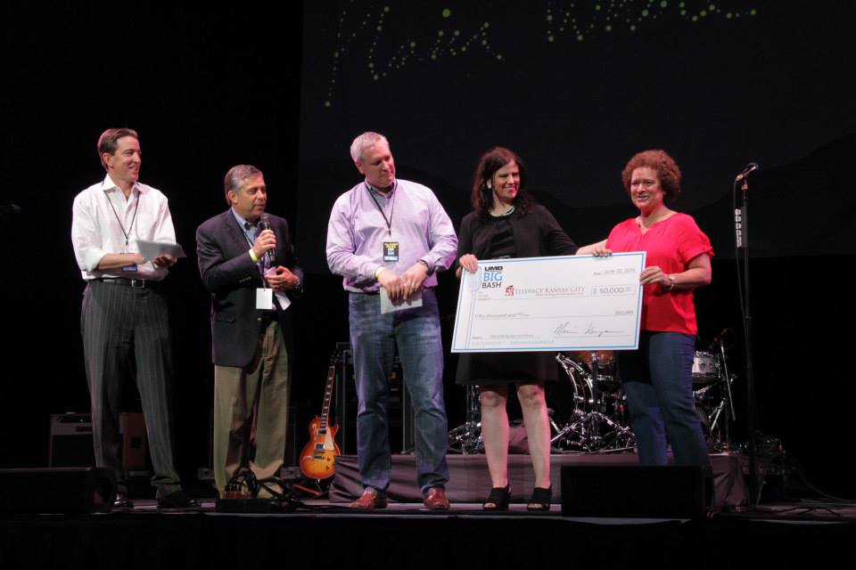 Carrie and Peggy accepting check, UMB Big Bash